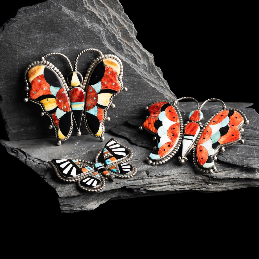 Zuni Large Mosaic Inlay Butterfly Pins / Brooches / Pendants: Zuni Large Mosaic Inlay Butterfly Pins / Brooches / Pendants mid-20th century lot of 3, includes: two larger examples set with spiny oyster, jet, and turquoise; marked STERLING D; sizes: length 3-3/4 
