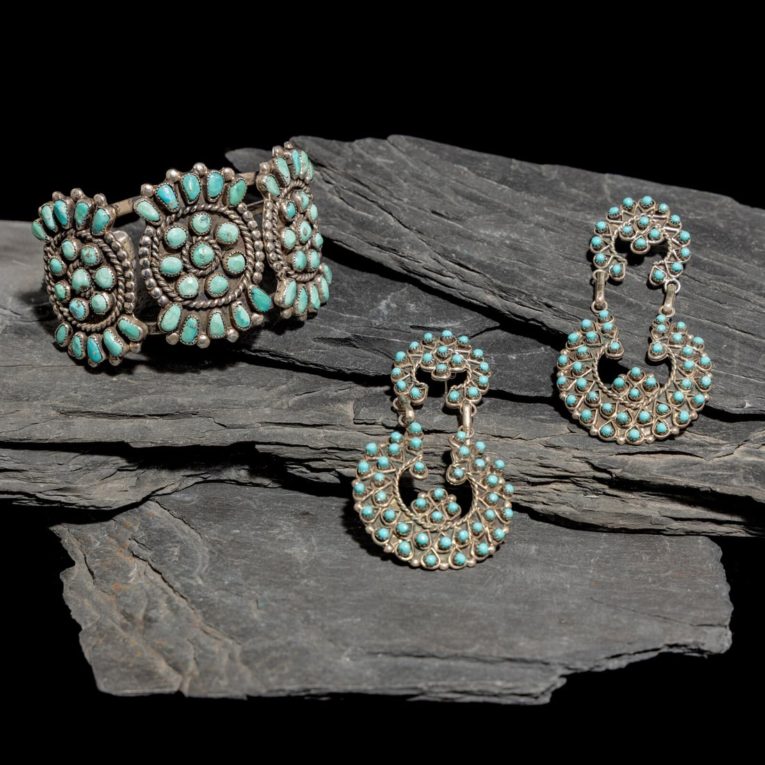 Zuni Silver and Petit Point Jewelry: Zuni Silver and Petit Point Jewelry third quarter 20th century lot of 2, includes: an unmarked cuff width 1-5/8 inches interior circumference 6-1/4 inches + gap length 3/4 inch weight 32.2 dwt. a pair
