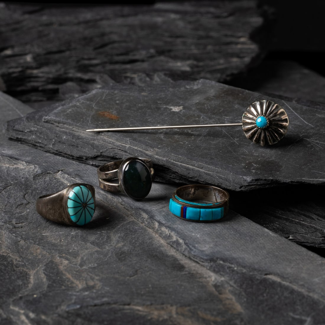 Navajo Rings and Hat Pin: Navajo Rings and Hat Pin late 20th - early 21st century lot of 4, includes: three rings, sizes include: 7.25, 7.5, and 7 combined weight 10 dwt. lastly, one hat pin length 3 inches x width 1/2 inch