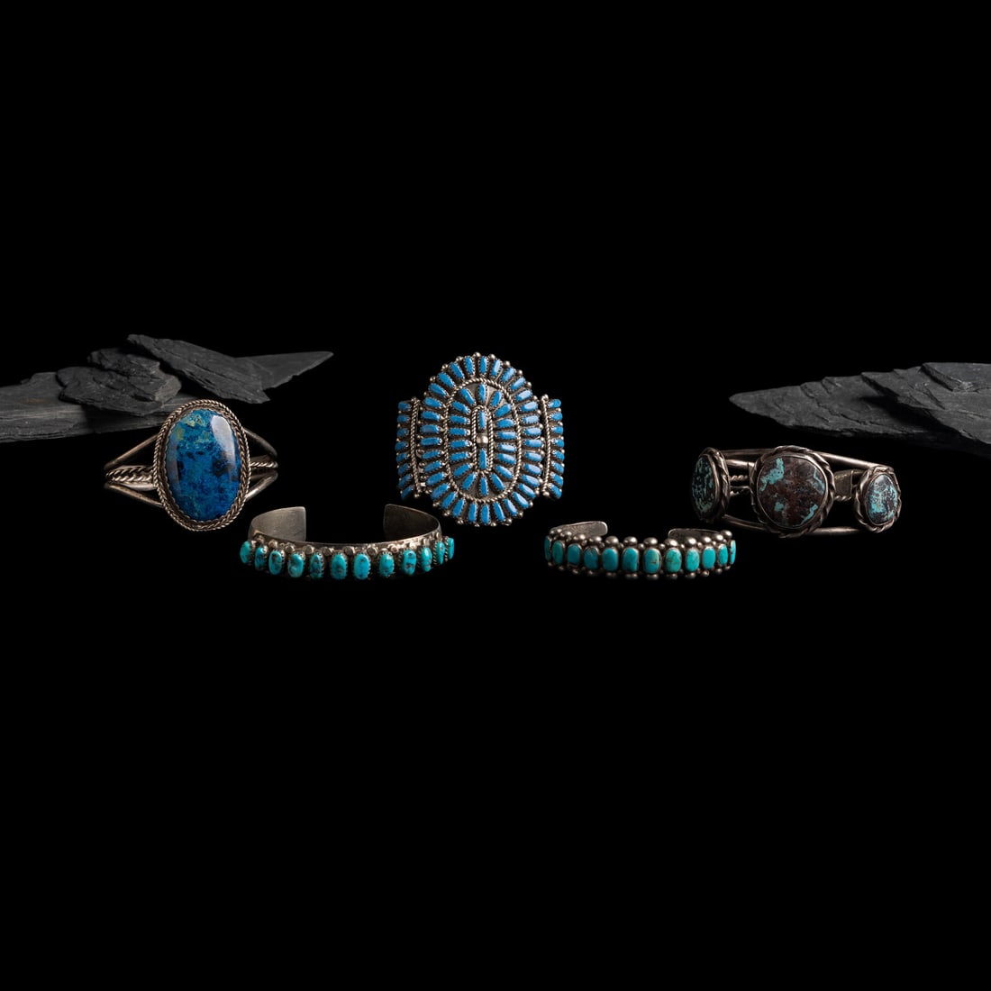 Navajo Silver Cuff Bracelets with Inlay: Navajo Silver Cuff Bracelets with Inlay third quarter 20th century lot of 5, includes: a cluster cuff bracelet set with sodalite; marked STERLING width 2-1/2 inches interior circumference 5-5/8