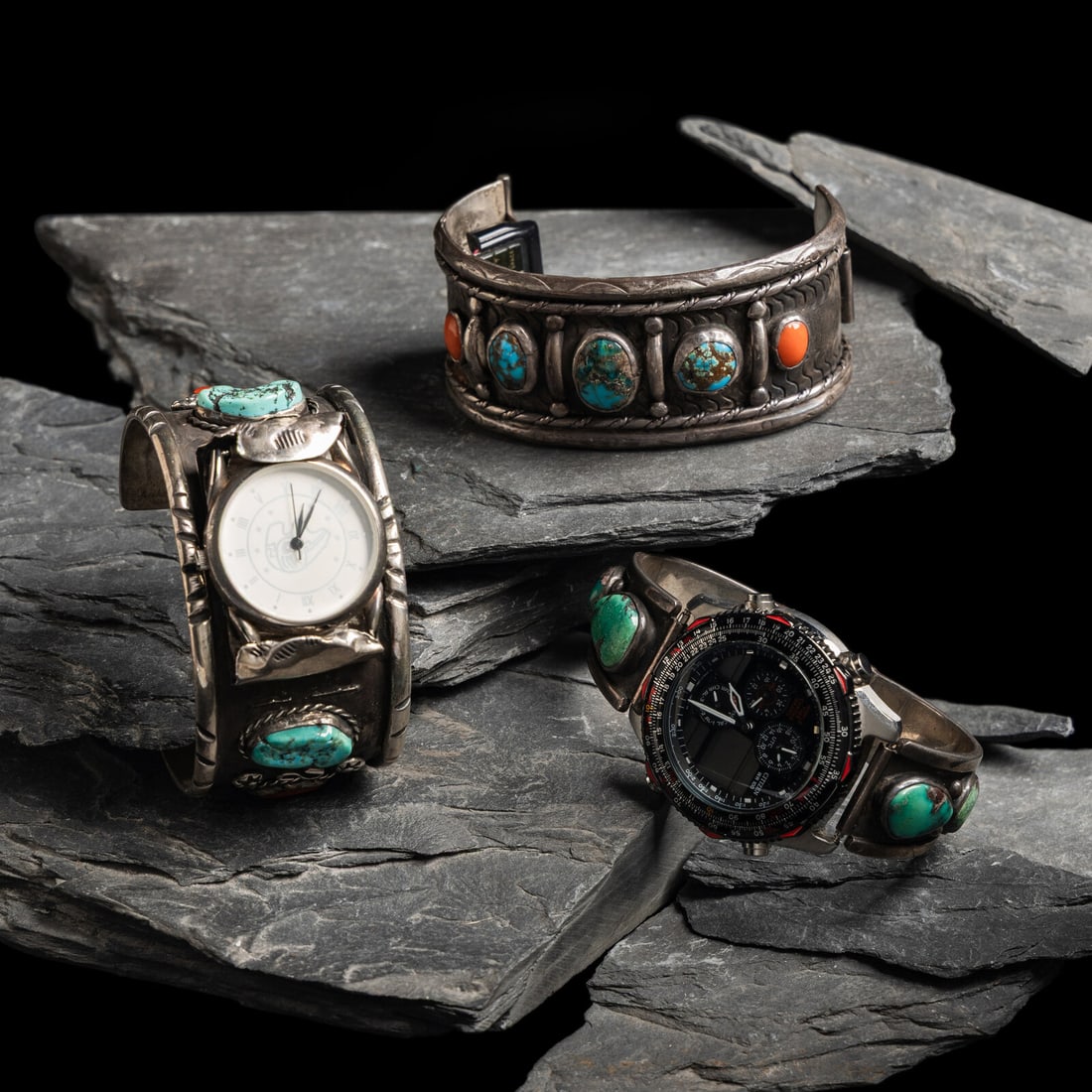 Navajo Silver and Turquoise Watch Bands: Navajo Silver and Turquoise Watch Bands third quarter 20th century lot of 3, includes: an unmarked cuff example set with coral and turquoise width 1-3/8 inches interior circumference 5-1/2 inches + ga