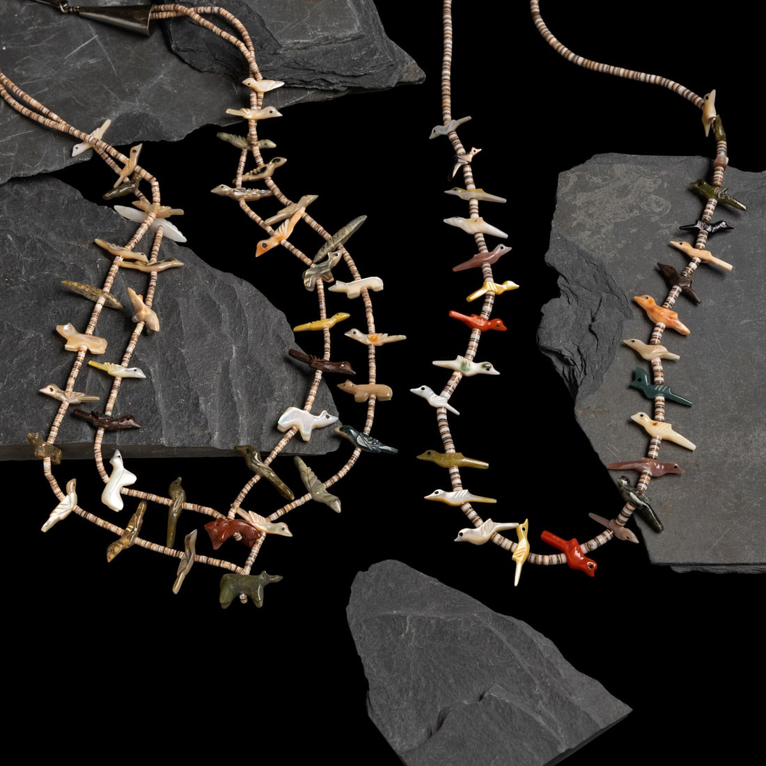 Pair of Zuni Fetish Necklaces: Pair of Zuni Fetish Necklaces third quarter 20th century lot of 2, neither is marked, includes: a double-strand necklace with a menagerie of animals length 21 inches drop length 11-1/4 inches weight