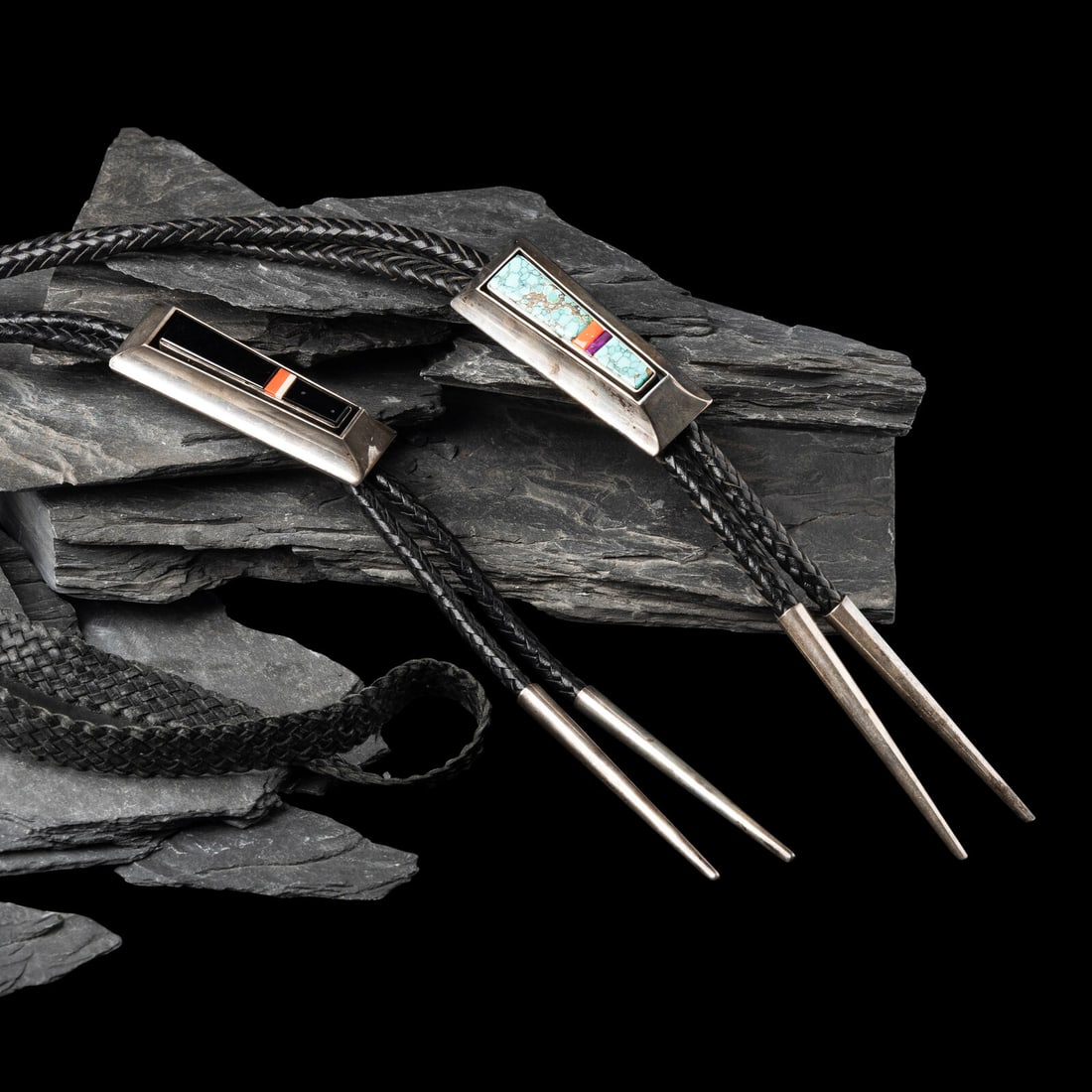 Larry Begay (DinÈ, 20th century) Pair of Sterling Silver Bolo Ties with Inlay (1 of 2)