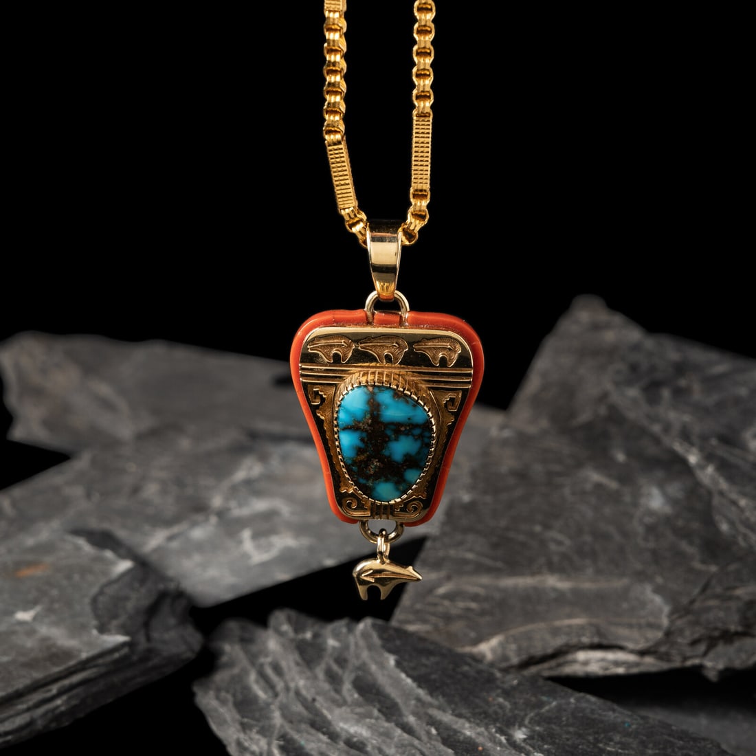 Herbert Taylor (DinÈ, 1951-1996) 14K Gold Bisbee Turquoise, and Mediterranean Coral Pendant,: Herbert Taylor (DinÈ, 1951-1996) 14K Gold Bisbee Turquoise, and Mediterranean Coral Pendant, with 22K Gold Chain featuring a heartline bear design; marked 14K with artist's conjoined HT hallmark 