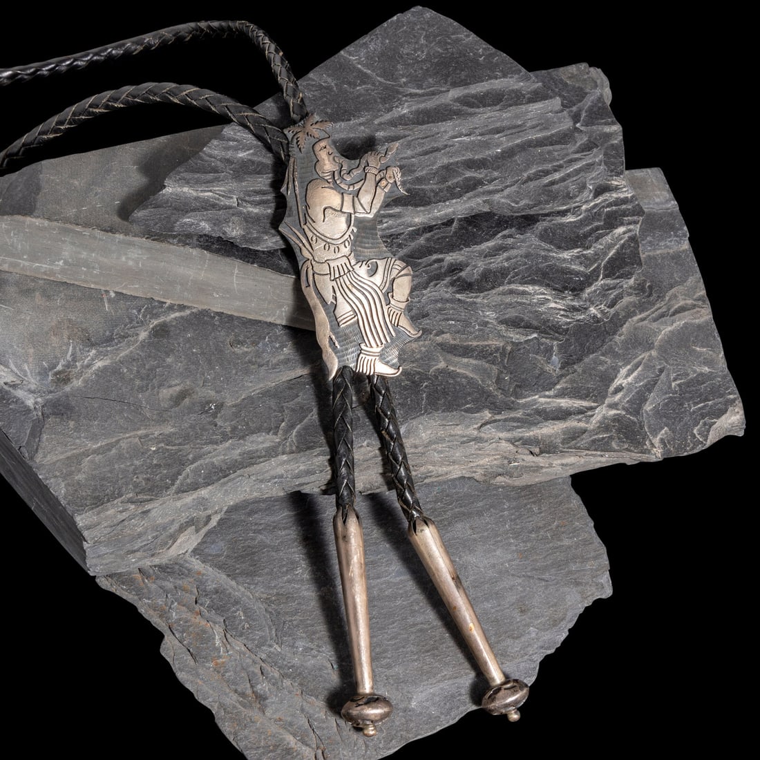 Roy Talahaftewa (Hopi, b. 1955) Sterling Silver Overlay Snake Dancer Bolo Tie: Roy Talahaftewa (Hopi, b. 1955) Sterling Silver Overlay Snake Dancer Bolo Tie marked STERLING with artist's waterbug hallmark slide length 3-1/2 inches x width 1-3/4 inches bolo length 33 inches total