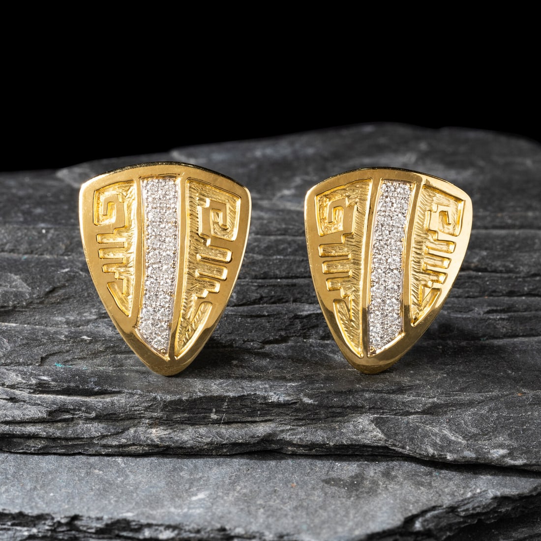 Dina Huntinghorse (Wichita-Kiowa, act. since 1980s) 18K Gold and Diamond Clip Earrings: Dina Huntinghorse (Wichita-Kiowa, act. since 1980s) 18K Gold and Diamond Clip Earrings each set with 23 diamonds; marked with artist's hallmark and 18K length 1-1/16 inch x width 7/8 inch (each) combi