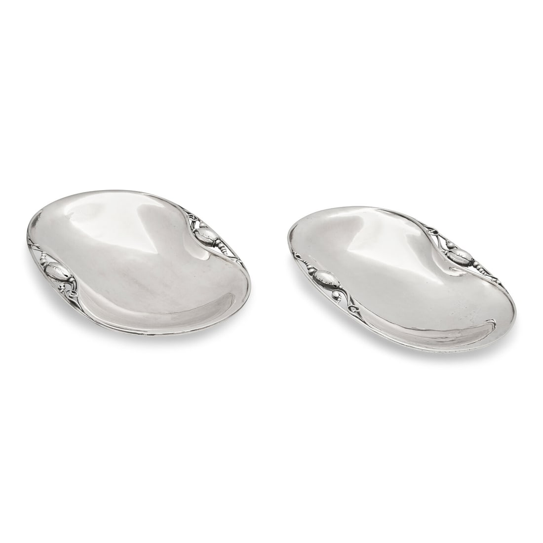 A Matched Pair of Georg Jensen Blossom Silver Dishes: A Matched Pair of Georg Jensen Blossom Silver Dishes First Half 20th Century pattern 2B. one example marked with the Crowned Jensen mark, the other marked with 'Georg Jensen and Weldel A/S', each mark