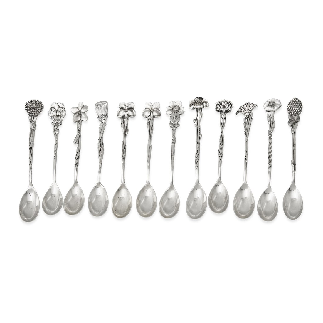A Set of Twelve Tiffany and Co. Silver Demitasse Spoons: A Set of Twelve Tiffany and Co. Silver Demitasse Spoons New York, NY, Late 19th Century Floral pattern, comprising: daisy, dandelion, pansy, violet, thistle, gentian (two), wild rose, marigold, ragged