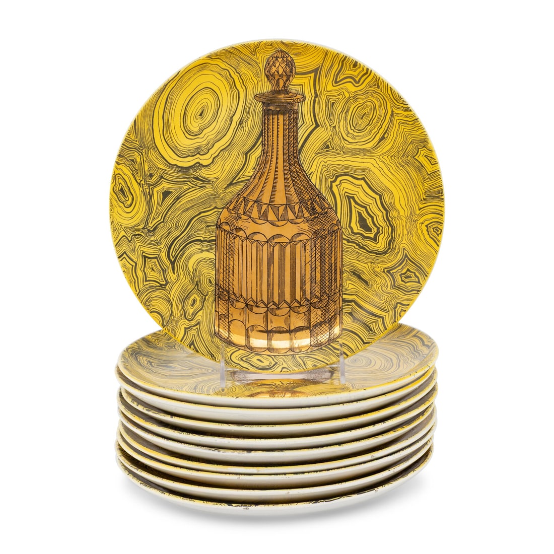 A Set of Ten Piero Fornasetti Stoviglie Plates: A Set of Ten Piero Fornasetti Stoviglie Plates Circa 1955 each marked 'Fornasetti/Milano/Made in Italy/1955' to underside. Diameter 10 inches. This lot is located in Chicago.