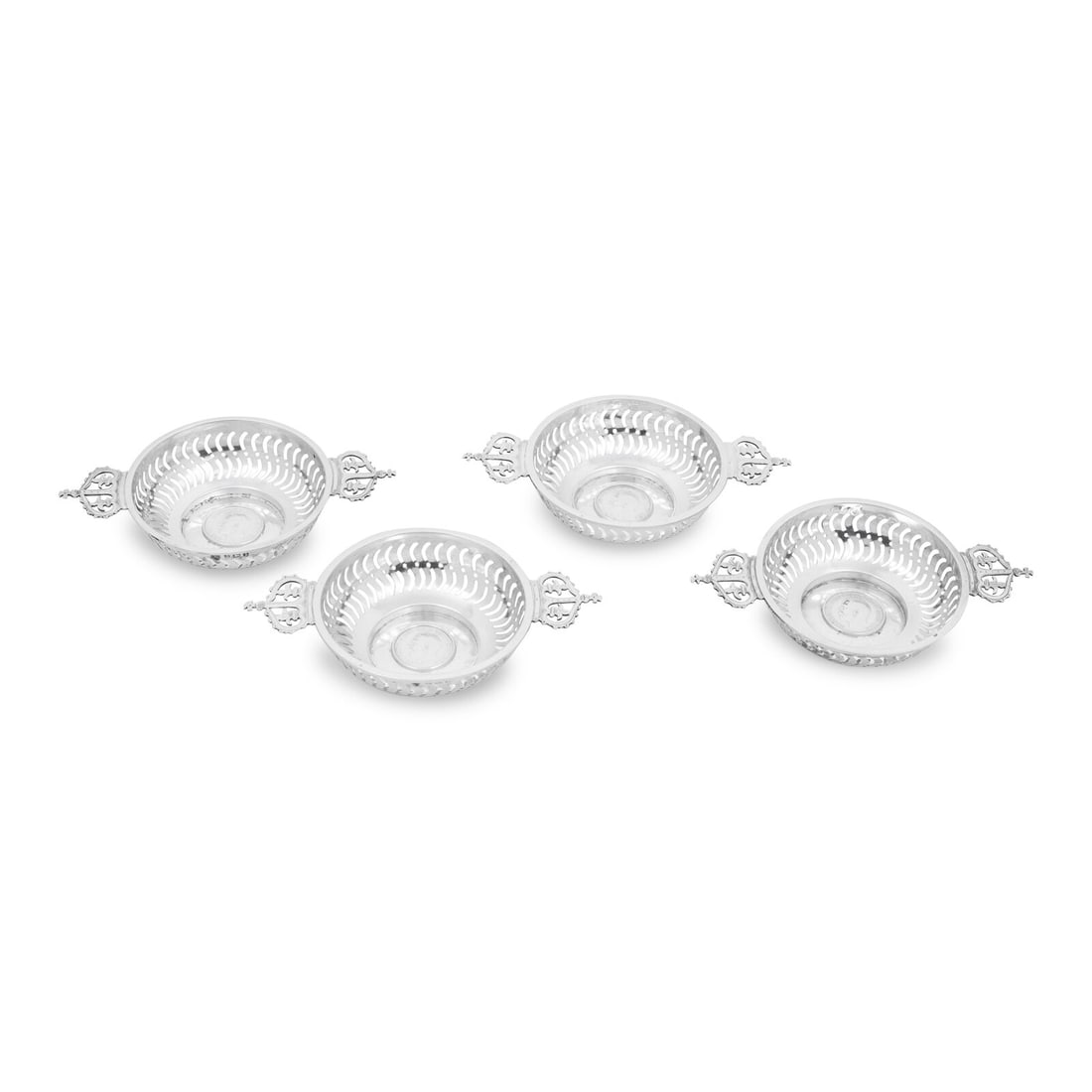 A Set of Four English Silver Coin-Inset Nut Dishes (1 of 5)