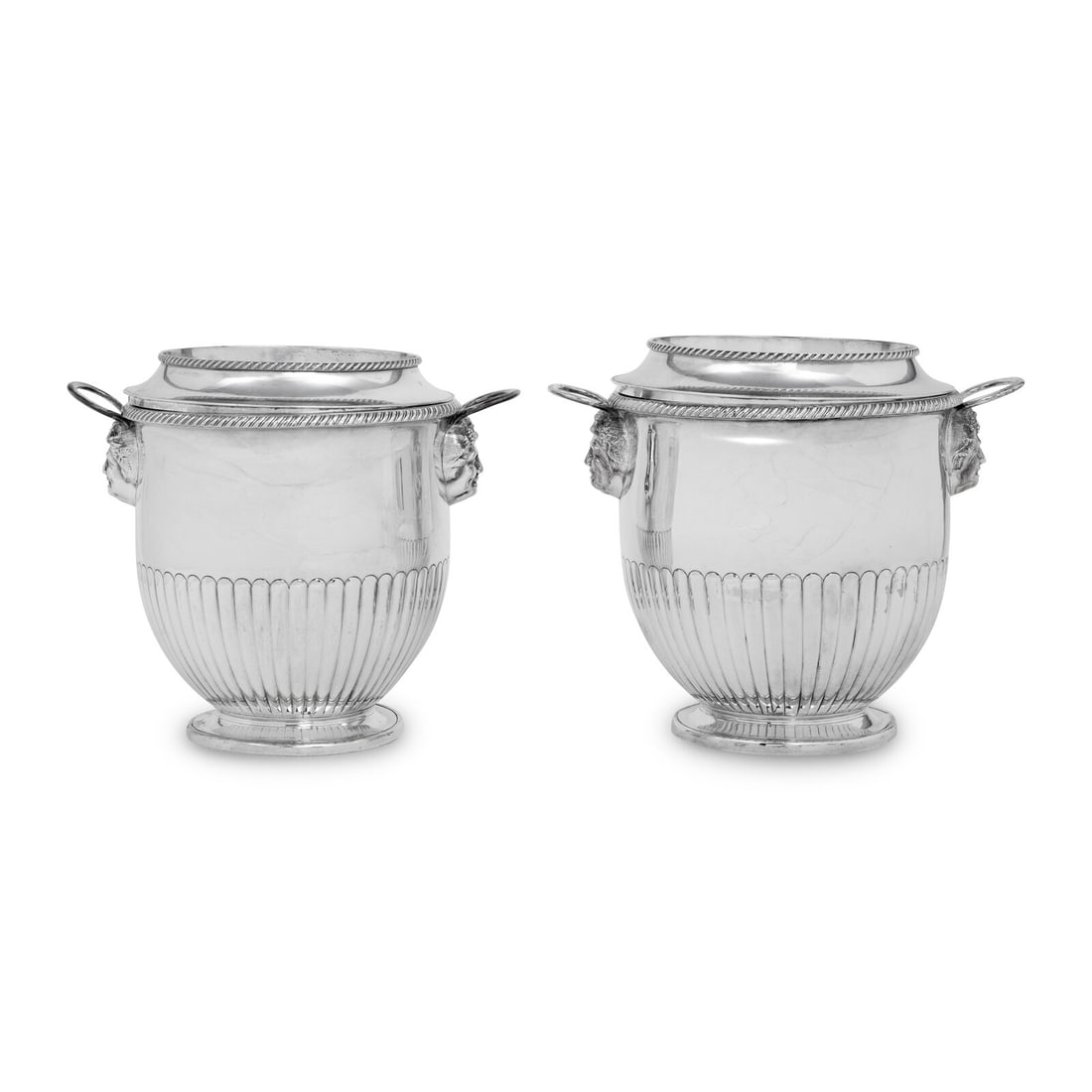 A Pair of Silver-Plate Wine Coolers: A Pair of Silver-Plate Wine Coolers 20th Century each having a removable liner and collar. Height 8 x width 9 1/4 x depth 7 inches. Property from a Private Collection This lot is located in Chicago.