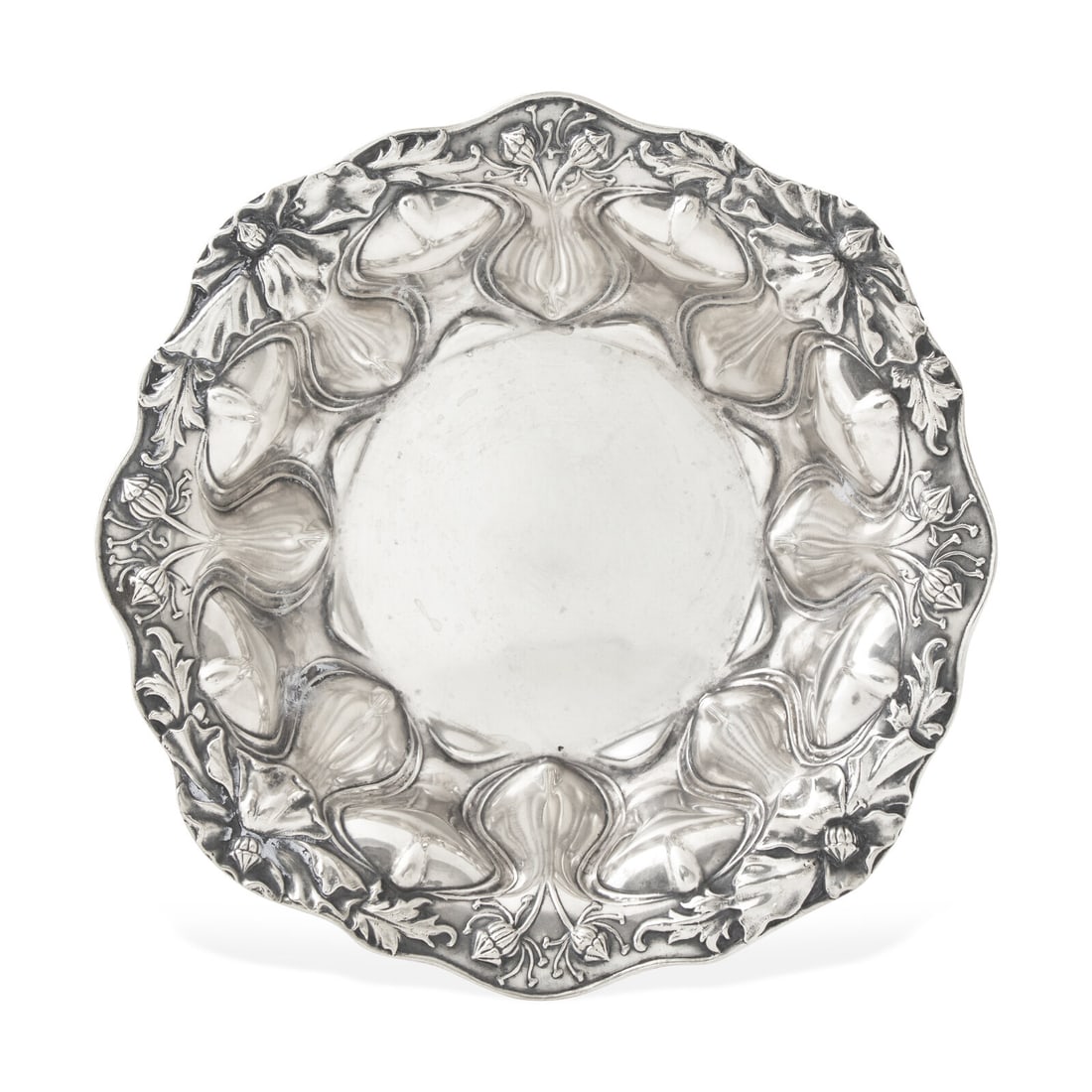An American Art Nouveau Silver Floral Repousse Bowl: An American Art Nouveau Silver Floral Repousse Bowl Alvin Mfg. Co. (founded 1886), Providence, RI, Early 20th Century marked to underside. 6 ozt 1 dwt Height 1 7/8 x diameter 8 5/8 inches. This lot is
