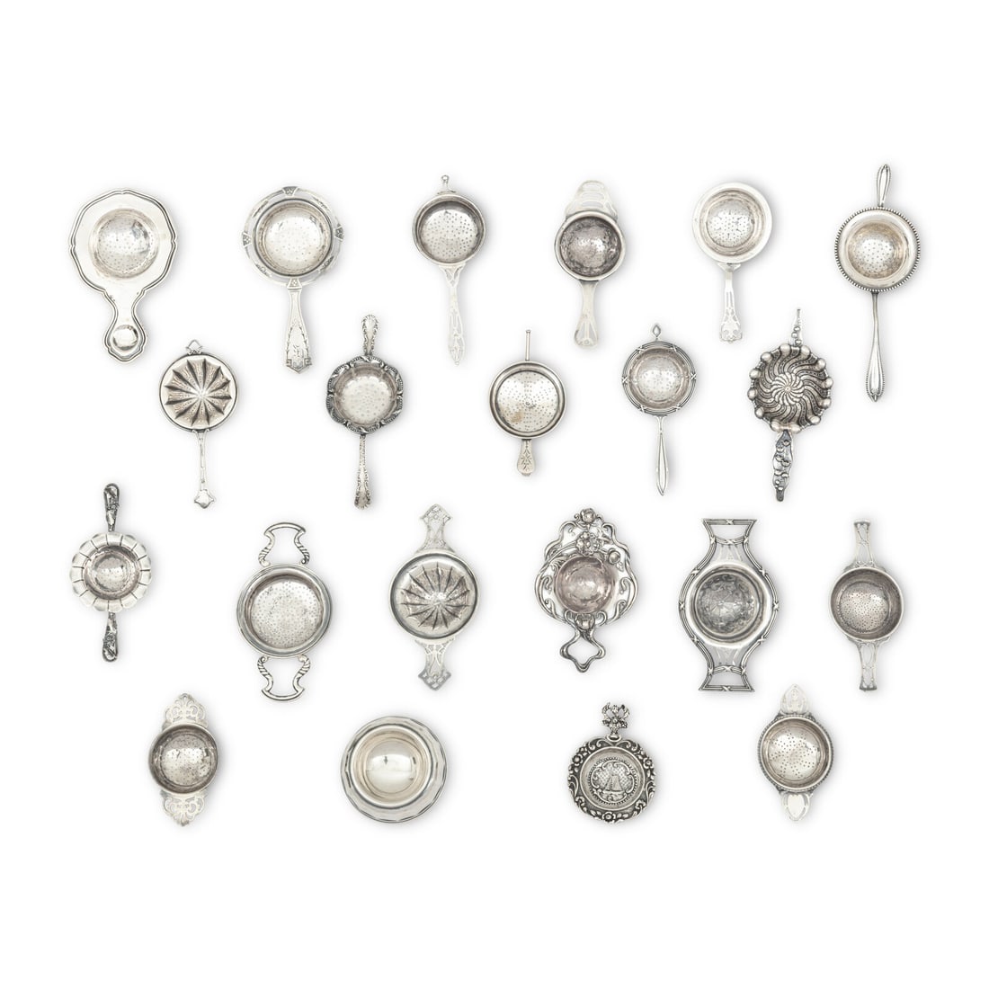A Collection of Twenty Silver Tea Strainers (1 of 4)