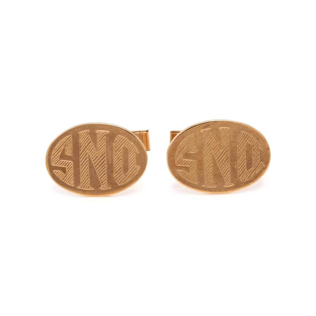 Yellow Gold Monogram Cufflinks: Yellow Gold Monogram Cufflinks 14 karat yellow gold. 3/4 inch wide. Stamp: 14K. Gross weight: 5.90 dwt. Property from the Estate of the Hon. Sandra Schultz Newman This lot is located in Chicago.