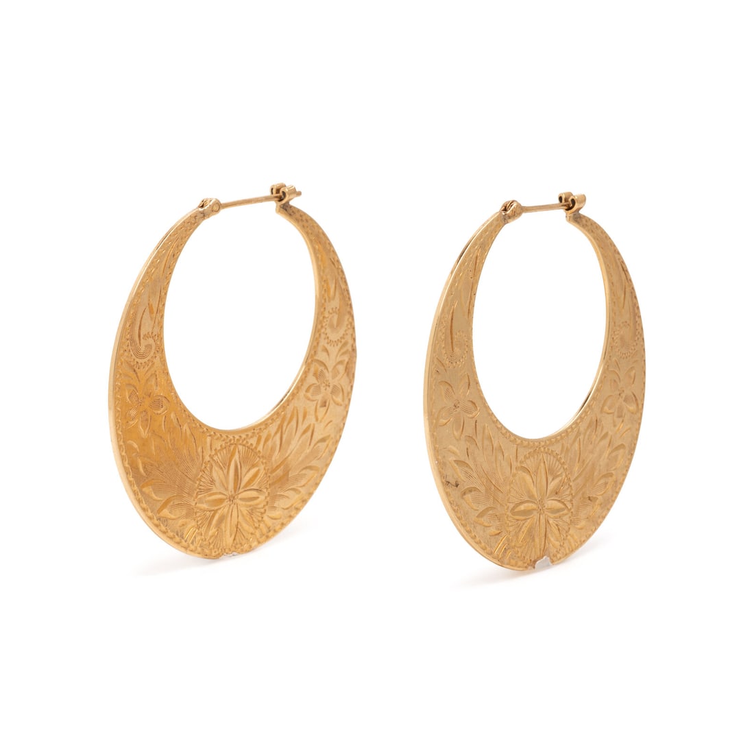 Yellow Gold Hoop Earrings: Yellow Gold Hoop Earrings 14 karat engraved and etched yellow gold. 1 1/2 inches long. Stamp: 14K. Gross weight: 9.45 dwt. Property from the Estate of the Hon. Sandra Schultz Newman This lot is