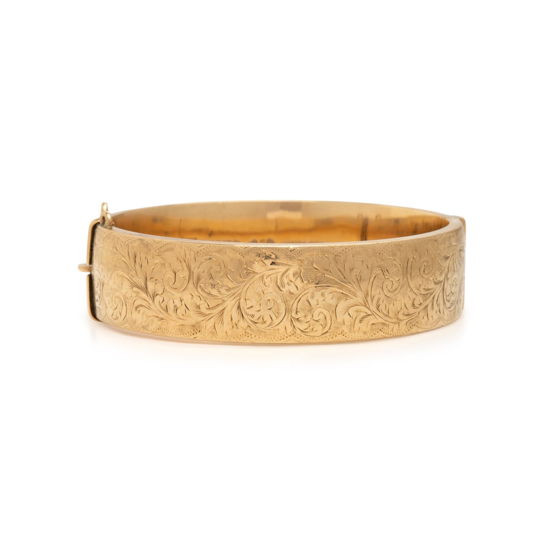 British, Low Karat Yellow Gold Bangle Bracelet: British, Low Karat Yellow Gold Bangle Bracelet Hinged with side clasp. Low karat yellow gold. 6 7/8 inches inner circumference. Stamp: WAX FILLED S&P 9 .375 (British hallmarks) ZELL BROS MADE IN E