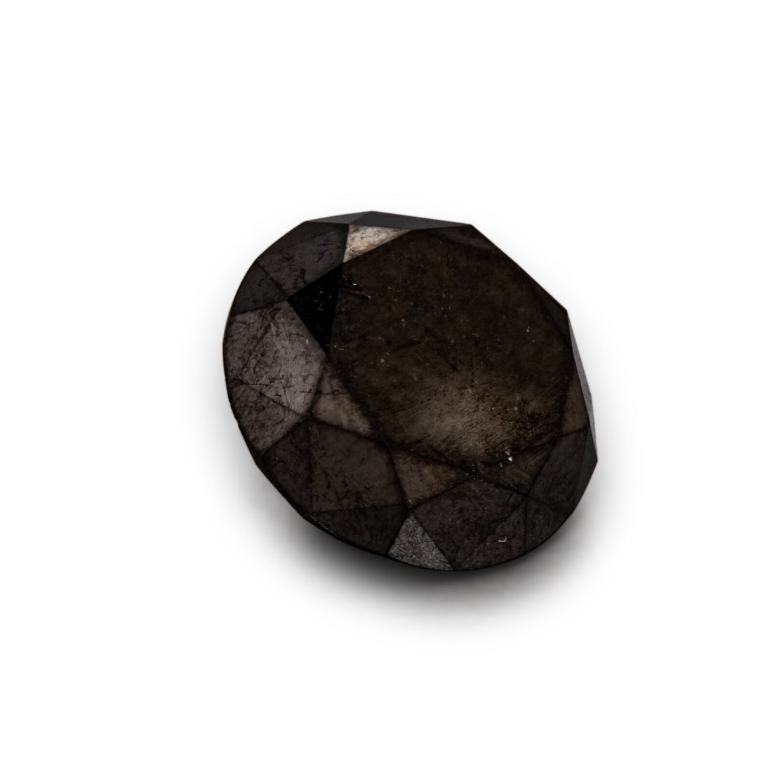 An Unmounted Black Diamond: An Unmounted Black Diamond An unmounted round brilliant cut black diamond weighing approximately 10.15 carats. Property from the Estate of Robert S. Reeter This lot is located in Chicago.