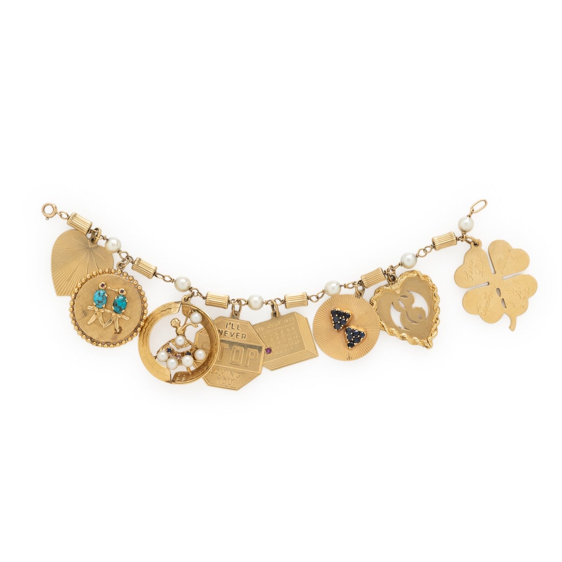 Yellow Gold and Multigem Charm Bracelet: Yellow Gold and Multigem Charm Bracelet Cultured pearls measuring approximately 6.00 - 6.30 mm, and eight charms variously set with colored stones and seed pearls. 14 karat yellow gold and yellow gold
