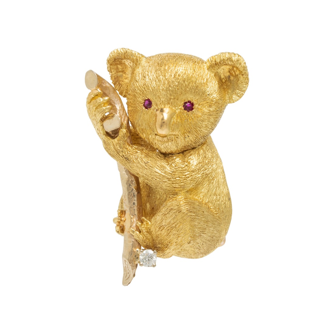 Yellow Gold Koala Brooch: Yellow Gold Koala Brooch Round rubies and round diamond. Yellow gold. 1 1/4 x 3/4 inches. Gross weight: 13.35 dwt. Property from a Private Collection This lot is located in Chicago.