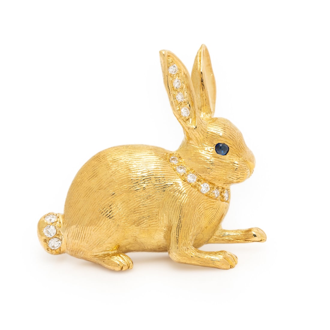 E. Wolfe & Co., Yellow Gold and Diamond Bunny Brooch: E. Wolfe & Co., Yellow Gold and Diamond Bunny Brooch Round cabochon sapphires and round diamonds. 18 karat yellow gold. 1 1/8 x 1 1/8 inches. Stamp: EW&Co 750 (British hallmarks). Gross weight