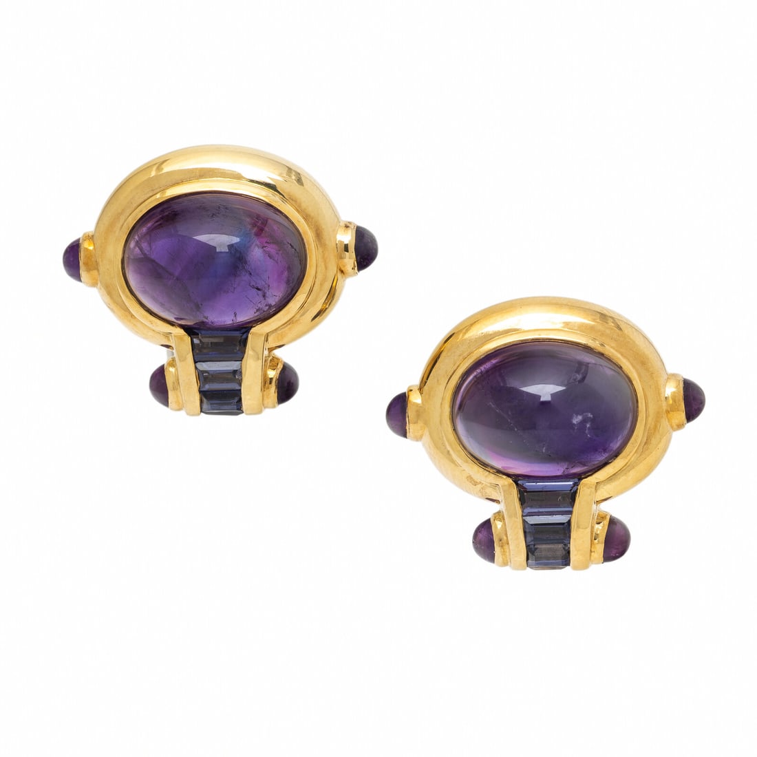 Amethyst, Iolite, and Yellow Gold Earrings: Amethyst, Iolite, and Yellow Gold Earrings Oval cabochon amethyst weighing approximately 21.00 carats total by formula, round cabochon amethyst, and channel-set baguette cut iolite. 18 karat yellow