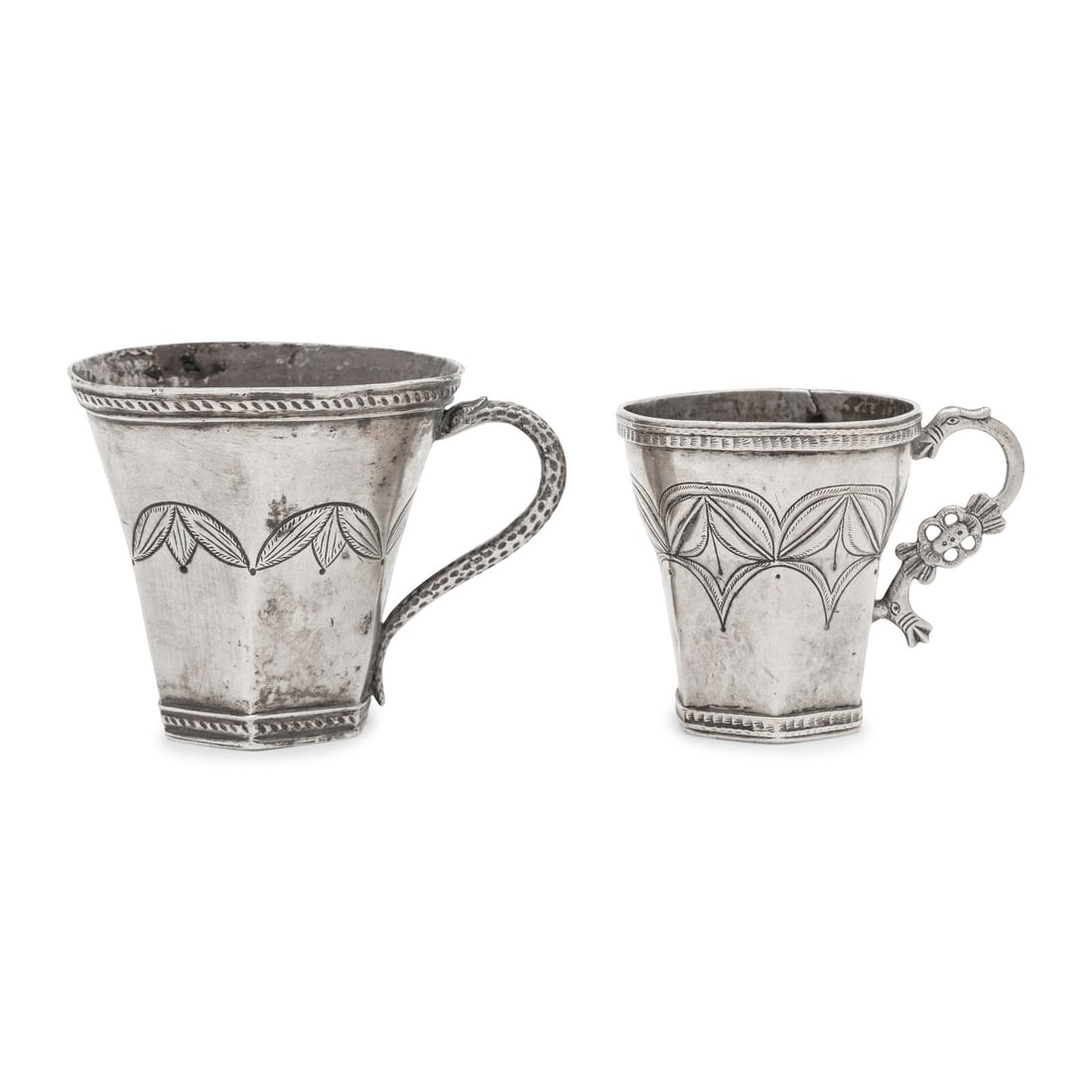 A Pair of South American Silver Child's Cups: A Pair of South American Silver Child's Cups 19th/20th Century apparently unmarked Height of larger 3 1/2 x width 5 inches. This lot is located in Chicago.