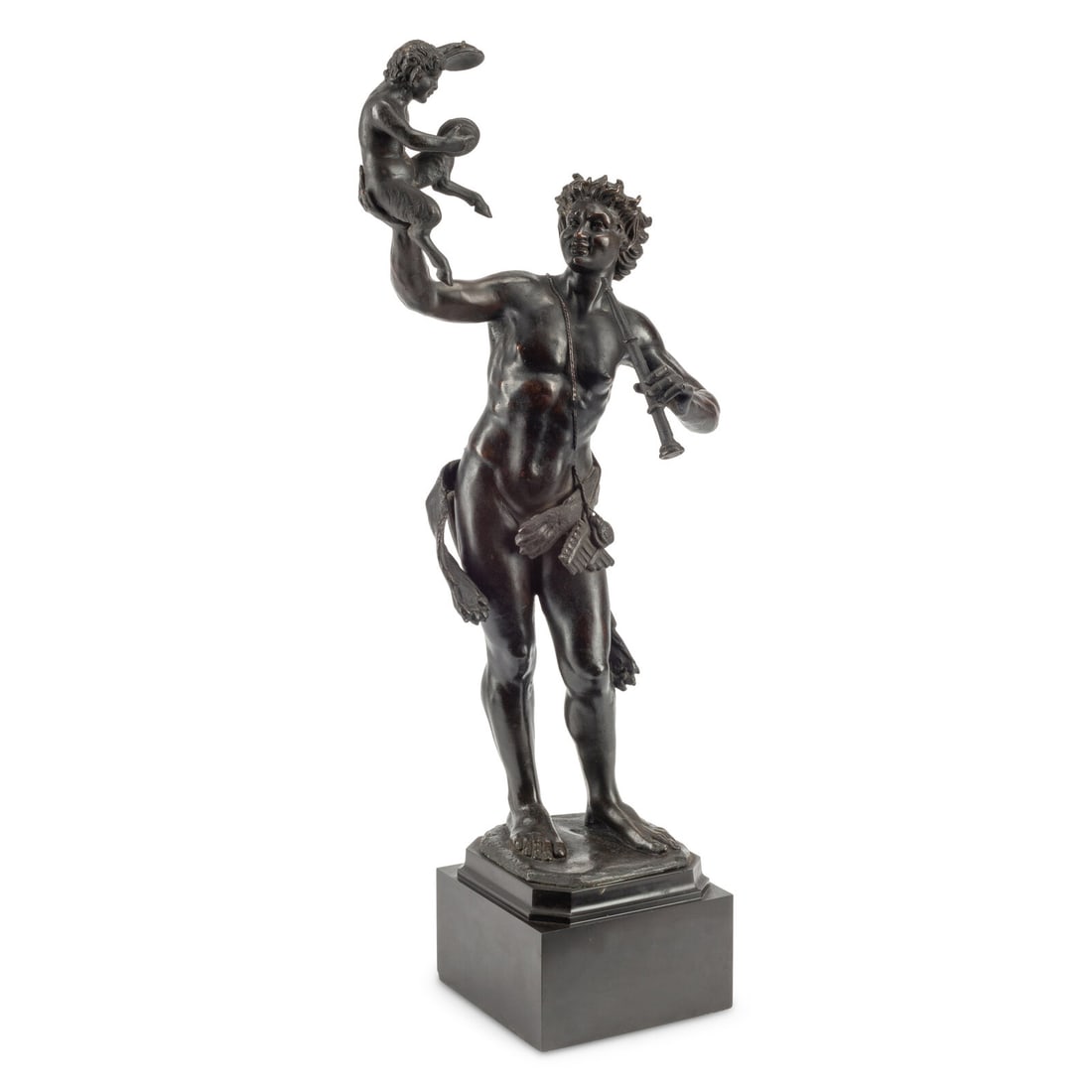 A Patinated Bronze Figure of Pan with a Faun: A Patinated Bronze Figure of Pan with a Faun 19th Century raised on a stone base. Height overall 26 x width 12 x depth 8 inches. This lot is located in Chicago.