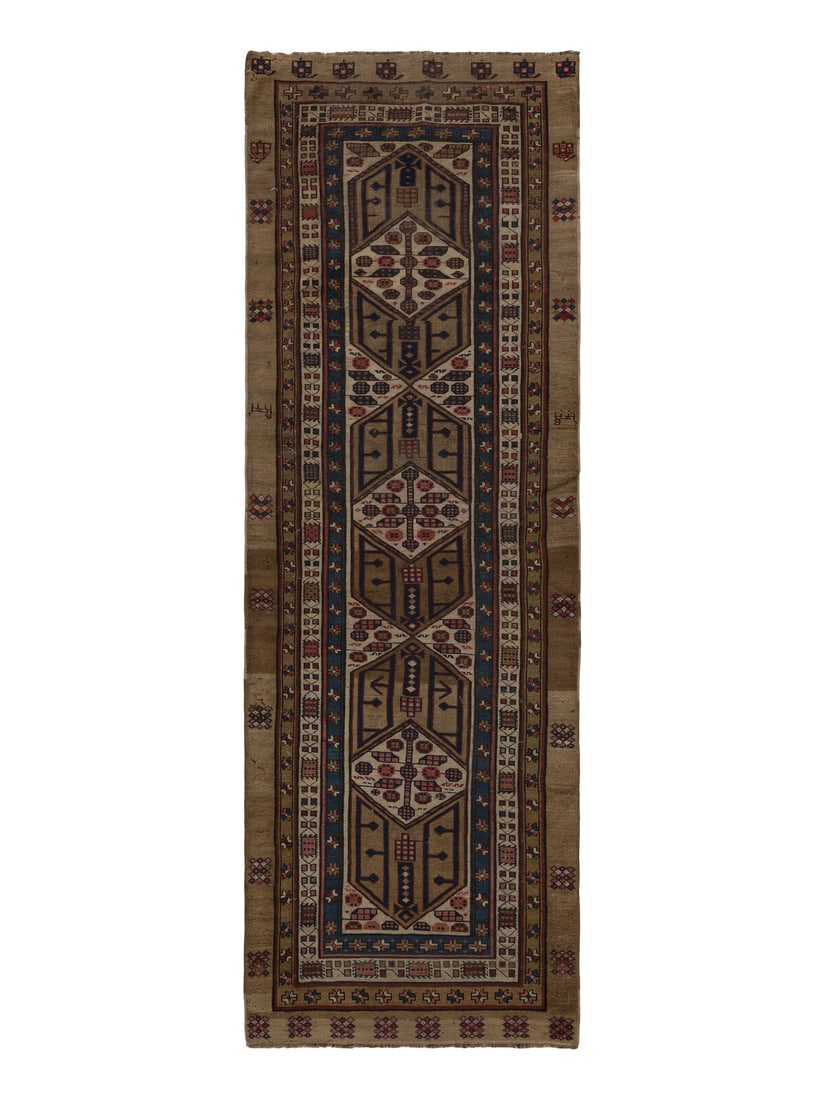 A Serab Runner: A Serab Runner Northwest Persia, Late 19th Century 11 feet x 3 feet 11 inches. Property from a Private Family Trust This lot is located in Chicago.