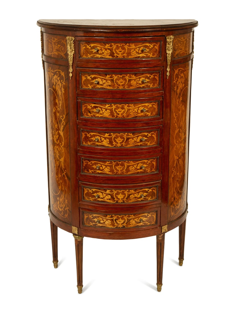 A Louis XVI Style Gilt Metal Mounted Marquetry Semainier: A Louis XVI Style Gilt Metal Mounted Marquetry Semainier 20th Century Height 48 1/2 x width 28 1/2 x depth 15 inches. This lot is located in Palm Beach.