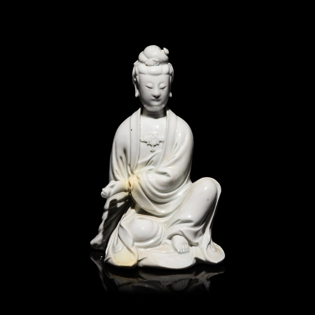 A Chinese Blanc de Chine Figure of Guanyin, Puji Yuren Mark: A Chinese Blanc de Chine Figure of Guanyin, Puji Yuren Mark Late 19th/Early 20th Century This lot is located in Chicago.