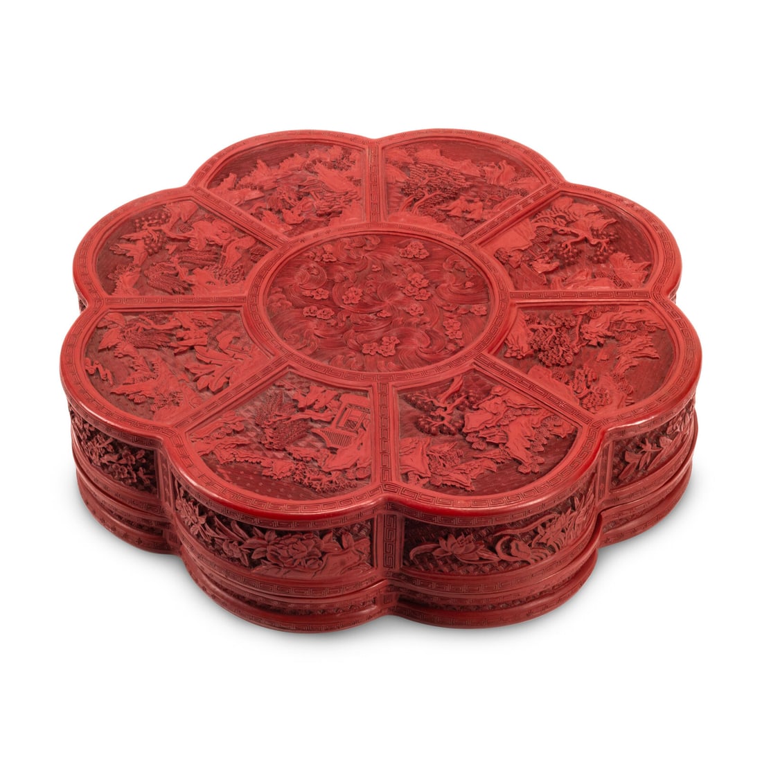 A Chinese Carved Red Lacquer Floriform Box: A Chinese Carved Red Lacquer Floriform Box 20th Century Height 5 x diameter 22 inches. This lot is located in Chicago.