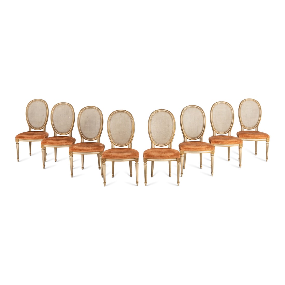 A Set of Eight Louis XVI Style CrËme-Painted and Parcel Gilt Dining Chairs (1 of 10)