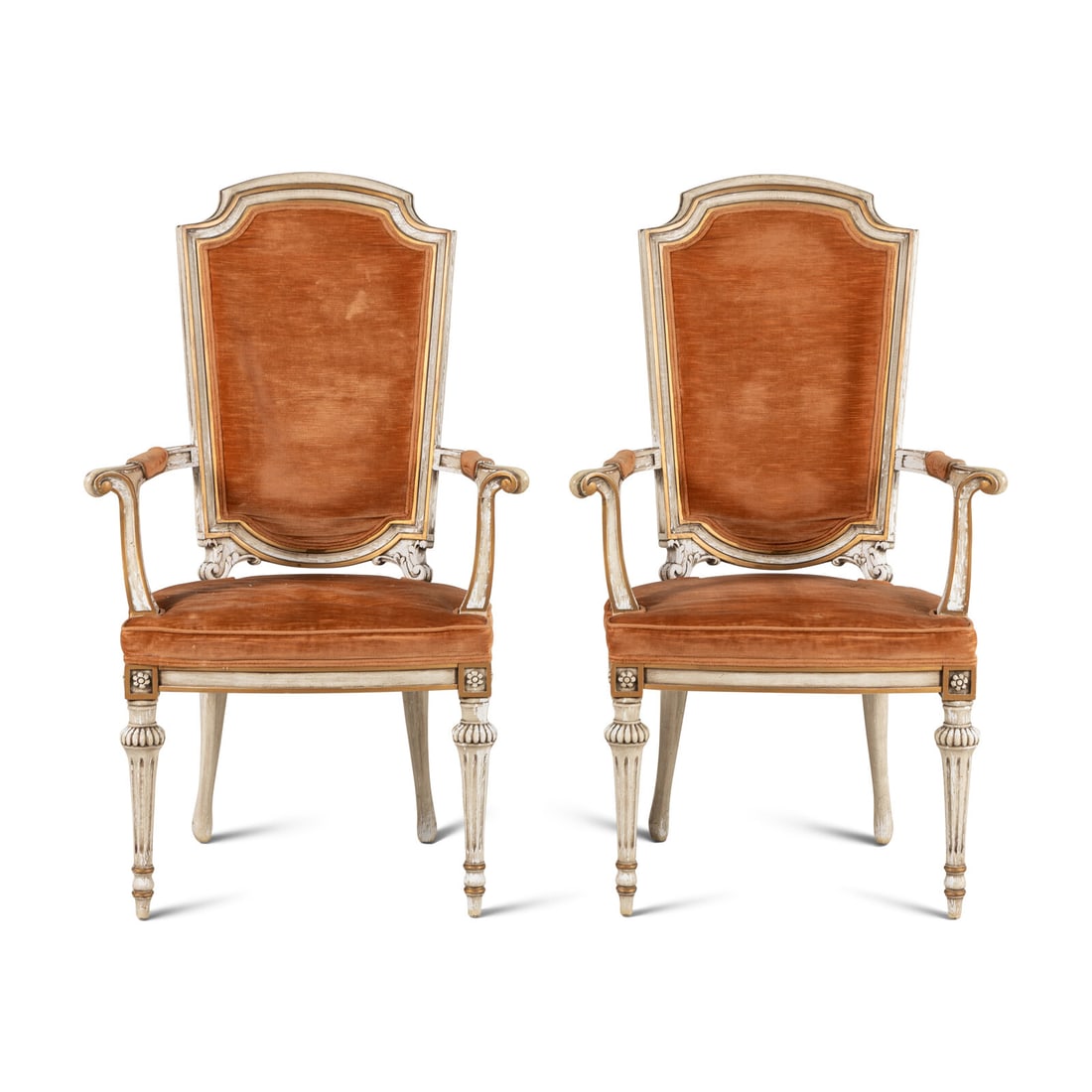 A Pair of Italian CrËme-Painted and Parcel Gilt Armchairs: A Pair of Italian CrËme-Painted and Parcel Gilt Armchairs Mid-20th Century Height 43 1/2 x width 27 x depth 21 inches. Property from Strawberry Hill: The Collection of Ada and Barrie Regan,