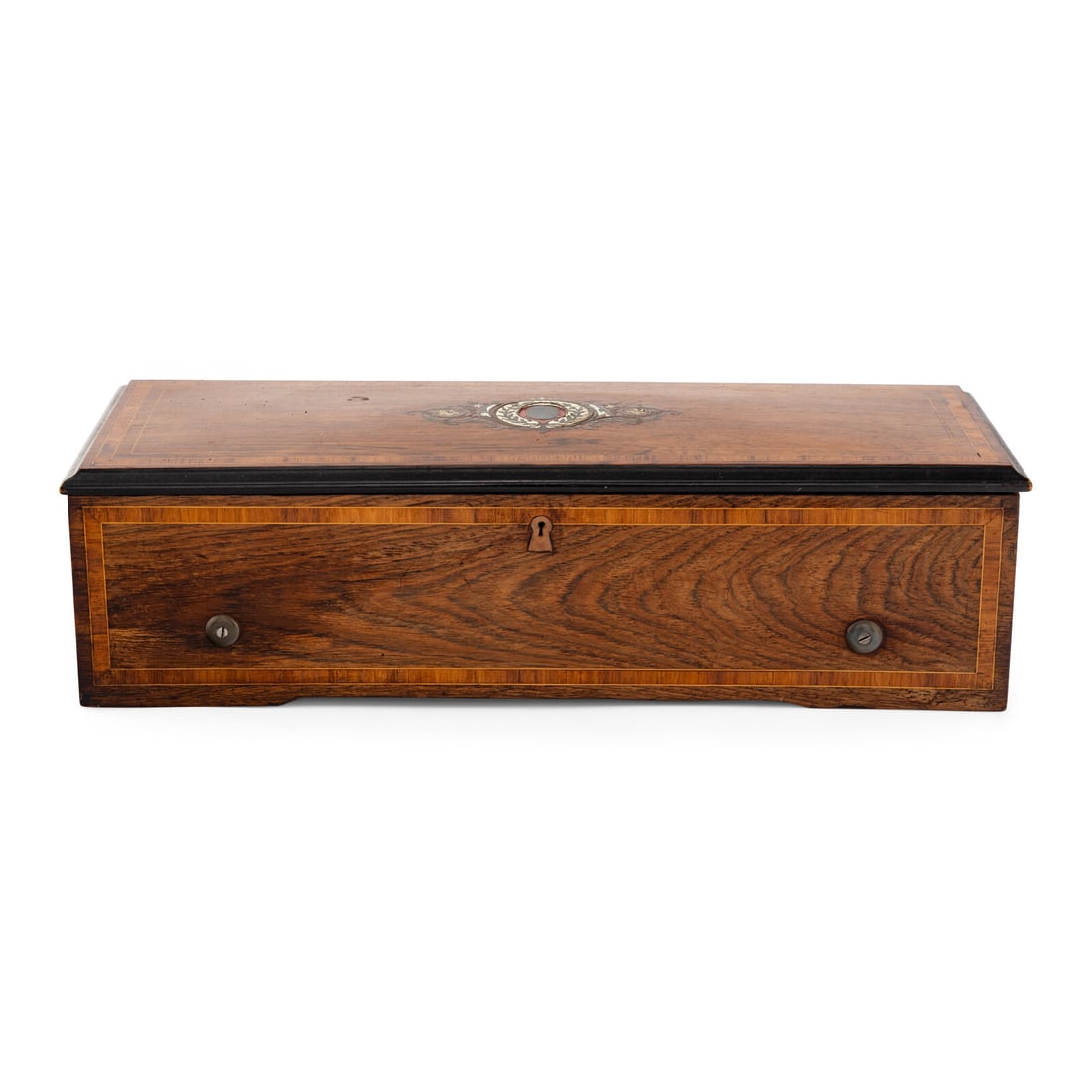 A Swiss Cylinder Music Box: A Swiss Cylinder Music Box Mid-19th Century playing eight airs on a 13-inch cylinder. Height of case 6 1/2 x width 24 x depth 9 inches. Property from Strawberry Hill: The Collection of Ada and Barrie