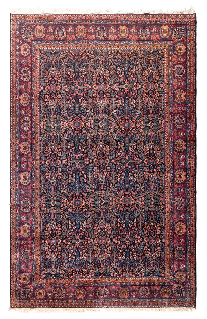 A Kermanshah Rug: A Kermanshah Rug Early 20th Century 15 feet 11 inches x 10 feet 8 inches. Property from Strawberry Hill: The Collection of Ada and Barrie Regan, Hillsborough, California This lot is located in