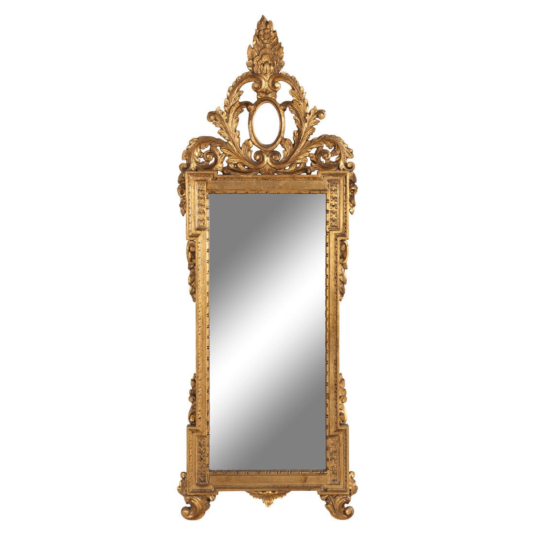 An Italian Baroque Style Giltwood Mirror: An Italian Baroque Style Giltwood Mirror 20th Century Height 54 x width 19 inches. Property from Strawberry Hill: The Collection of Ada and Barrie Regan, Hillsborough, California This lot is located