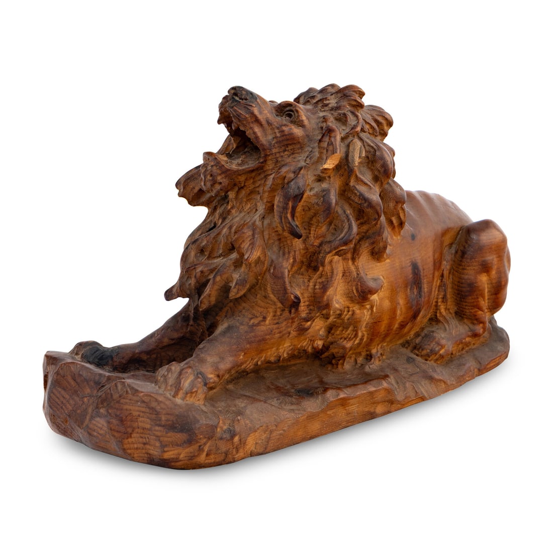 A Carved Oak Model of a Lion: A Carved Oak Model of a Lion Late 19th/Early 20th Century Height 9 1/2 x width 6 x depth 16 inches. Property from Strawberry Hill: The Collection of Ada and Barrie Regan, Hillsborough, California