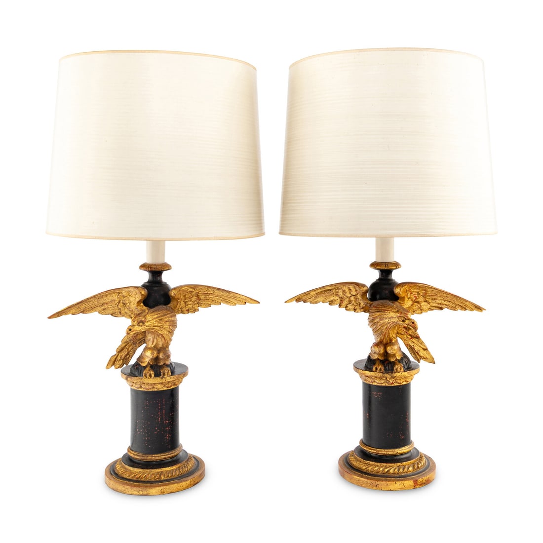 A Pair of Painted and Parcel Gilt Eagle-Form Lamps: A Pair of Painted and Parcel Gilt Eagle-Form Lamps 20th Century Height overall 32 1/2 inches. Property from Strawberry Hill: The Collection of Ada and Barrie Regan, Hillsborough, California This lot