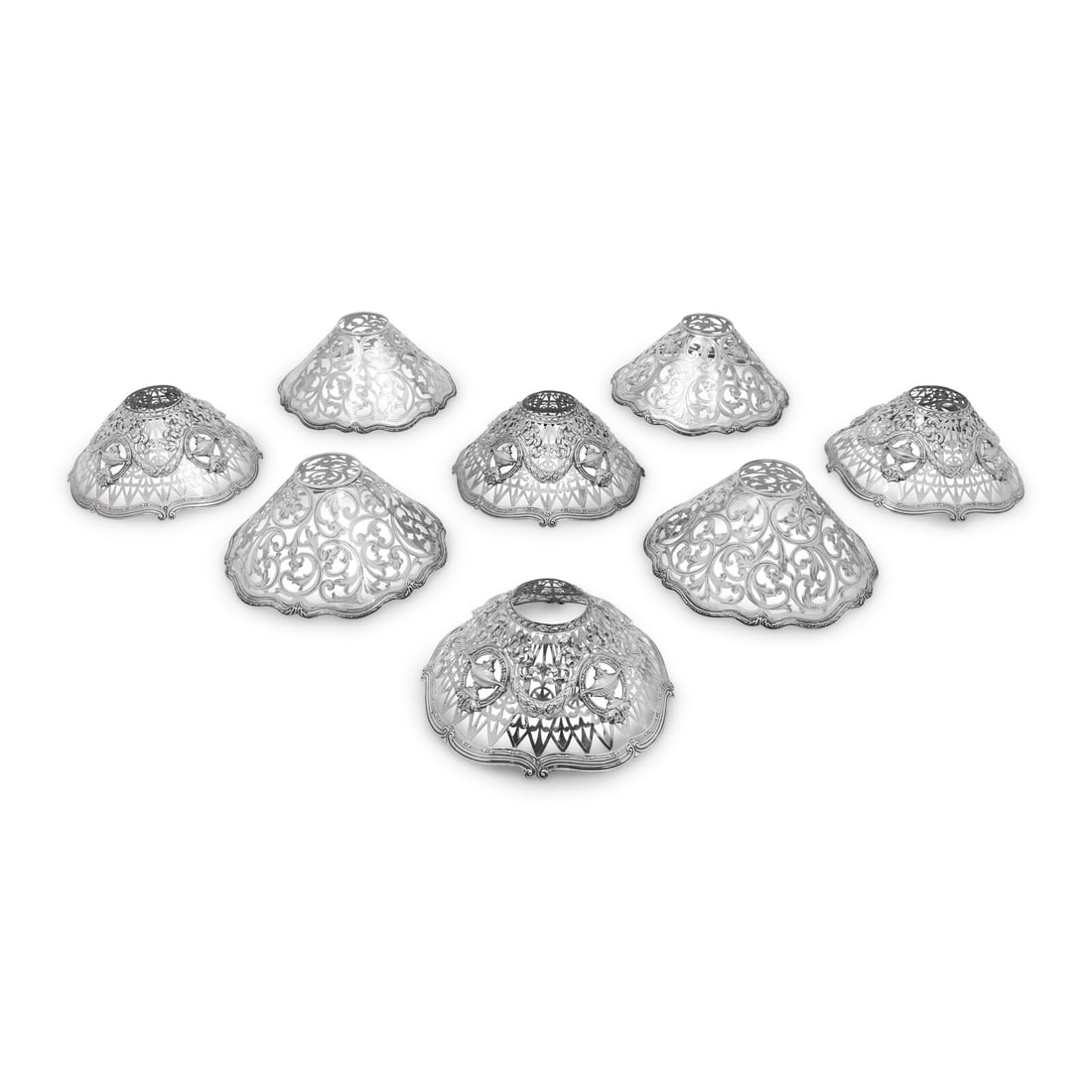 Two Sets of Four American Silver Shades: Two Sets of Four American Silver Shades Shreve and Co., San Francisco, Early 20th Century each example marked 'Sterling' 44 ozt 13 dwt Height 4 x diameter 8 inches. Property from Strawberry Hill: The