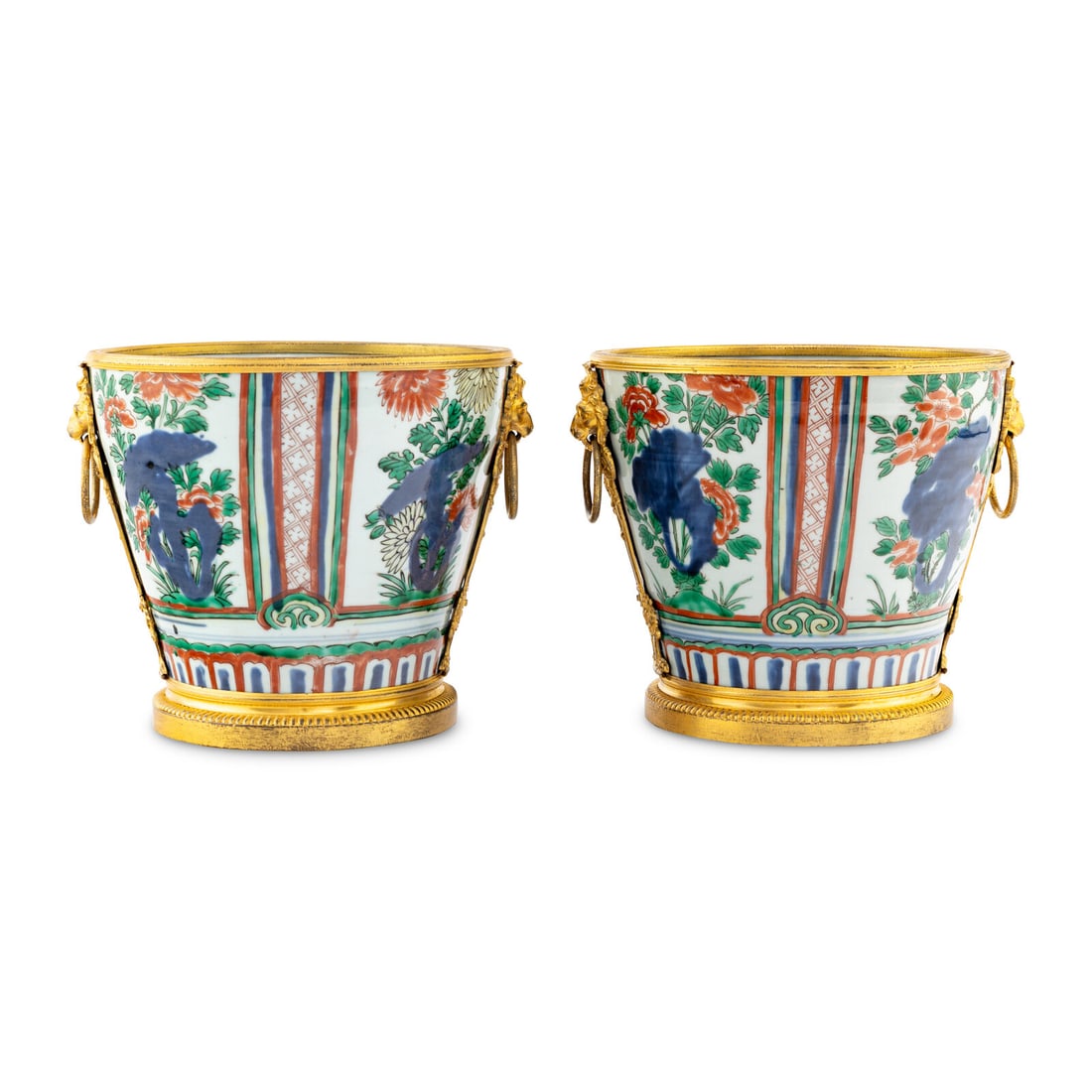 A Pair of Chinese Wucai Porcelain and Ormolu Mounted JardiniËres: A Pair of Chinese Wucai Porcelain and Ormolu Mounted JardiniËres The Porcelain 17th Century, the Mounts 18th Century Height 9 x diameter 9 3/4 inches. Property of a California Collector This lot
