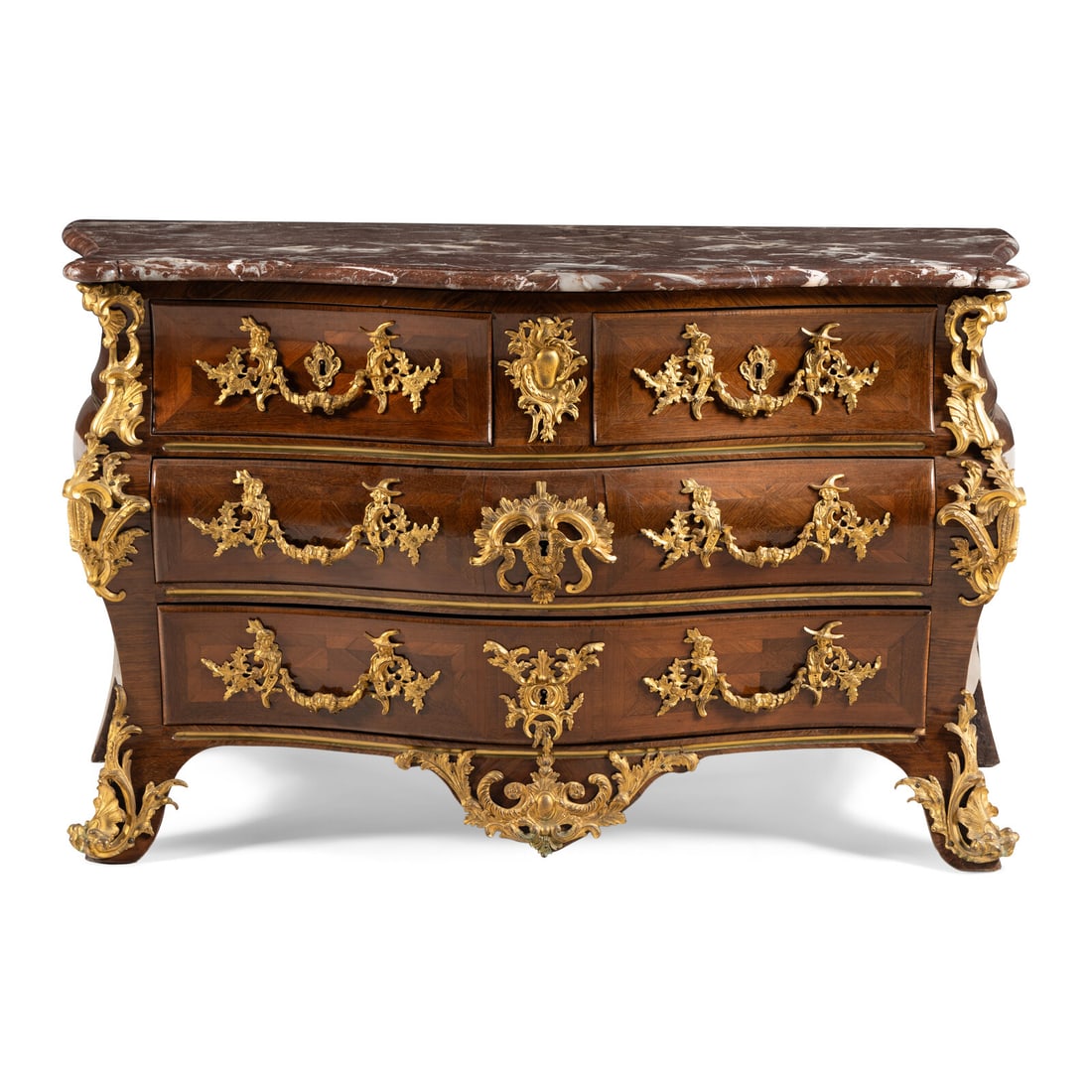 A Louis XV Kingwood Parquetry and Gilt Bronze Mounted Marble-Top Commode: A Louis XV Kingwood Parquetry and Gilt Bronze Mounted Marble-Top Commode By Mathieu Criaerd, Mid-18th Century bearing the ÈbÈniste's stamp 'M CRIAERD' to one corner of the case top. Height