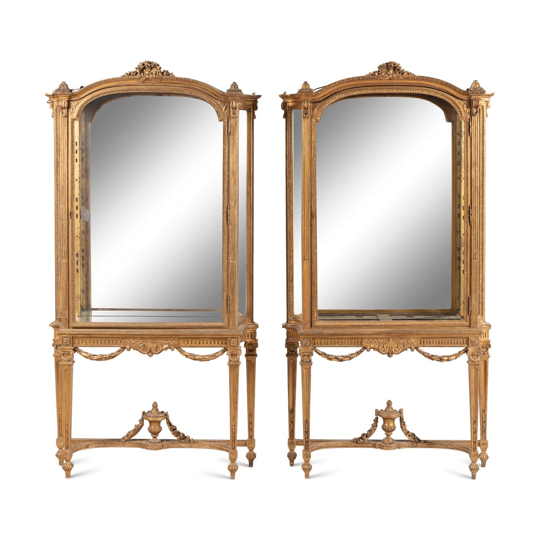 A Pair of Louis XVI Style Giltwood Vitrine Cabinets: A Pair of Louis XVI Style Giltwood Vitrine Cabinets 19th Century each with three adjustable glass shelves (not pictured). Overall height 74 x width 39 x depth 11 inches. Property from the Wetherill Fa