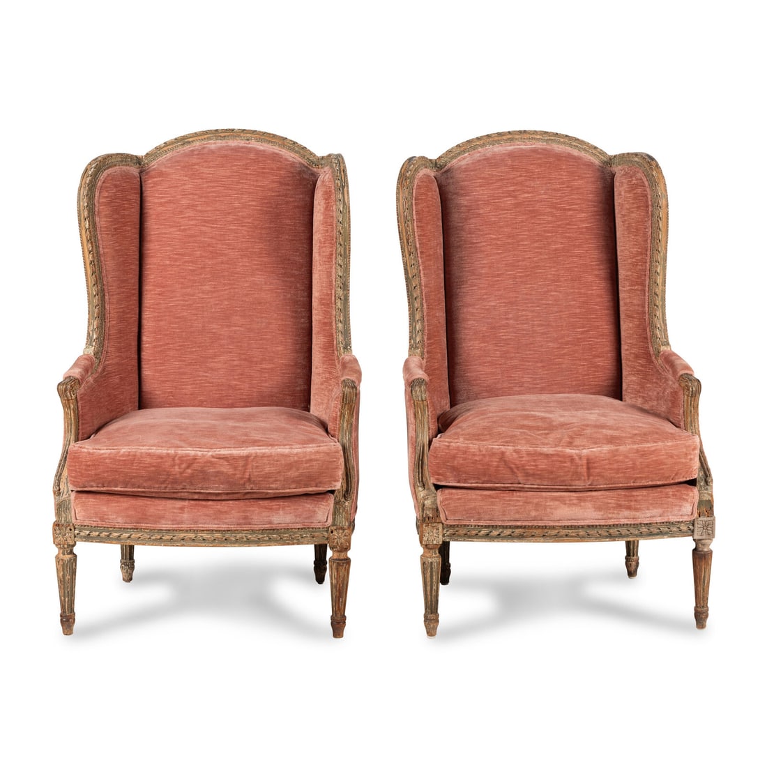 A Pair of Louis XVI Style Painted BergËres ‡ Oreilles: A Pair of Louis XVI Style Painted BergËres ‡ Oreilles 19th Century Height 46 1/2 x width 28 x depth 22 1/2 inches. This lot is located in Chicago.