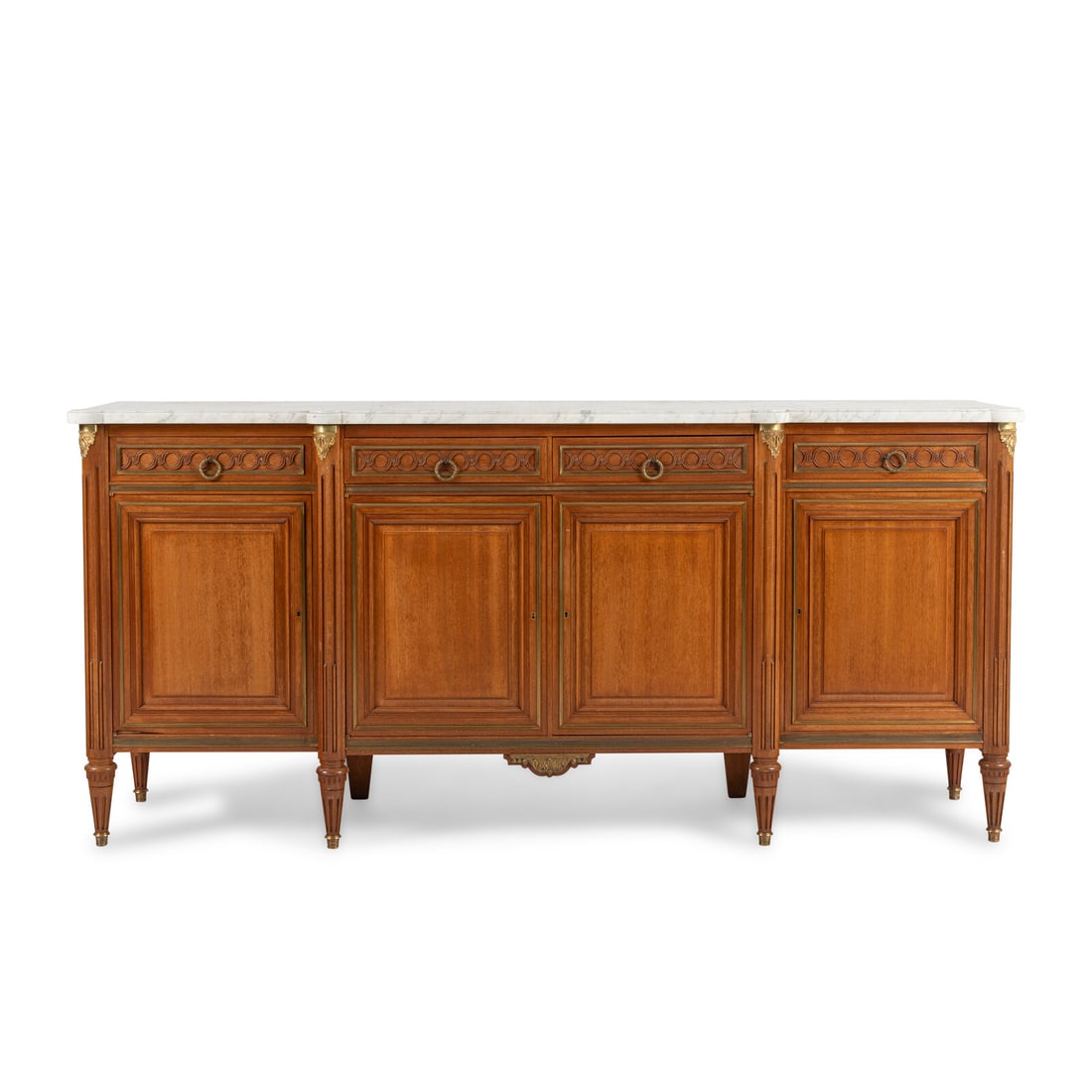 A Louis XVI Style Fruitwood Marble-Top Serving Cabinet: A Louis XVI Style Fruitwood Marble-Top Serving Cabinet 20th Century Height 42 1/4 x width 90 1/2 x depth 20 1/4 inches. Property from the Collection of Bill Miller, Nashville, Tennessee This lot is lo