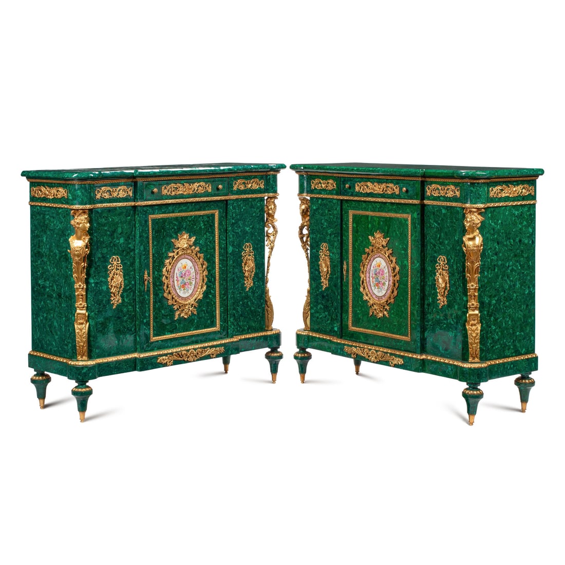 A Pair of Louis XVI Style Gilt Bronze Mounted and Malachite Veneered Cabinets: A Pair of Louis XVI Style Gilt Bronze Mounted and Malachite Veneered Cabinets 20th Century Height 46 1/2 x width 55 x depth 20 inches. This lot is located in Chicago.