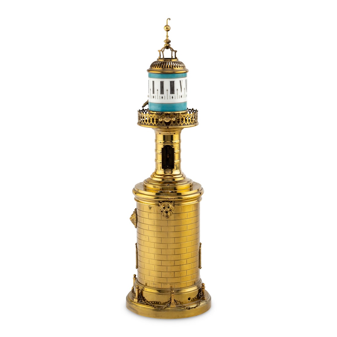 A French Brass and Glass Lighthouse-Form Annular Clock: A French Brass and Glass Lighthouse-Form Annular Clock 19th Century Height 21 x diameter 6 1/2 inches. Property from a Private Collection This lot is located in Chicago.