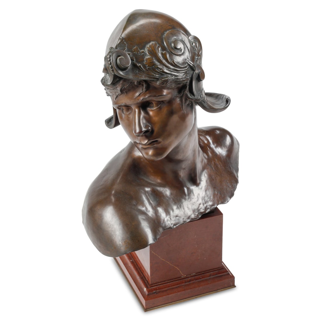 After Emmanuel Hannaux (French, 1855-1934) Bust of a Young Warrior: After Emmanuel Hannaux (French, 1855-1934) Bust of a Young Warrior bronze signed 'E. HANNAUX' and with 'Jollet & Cie' foundry stamp to figure's left shoulder Height 22 x width 16 x depth 11