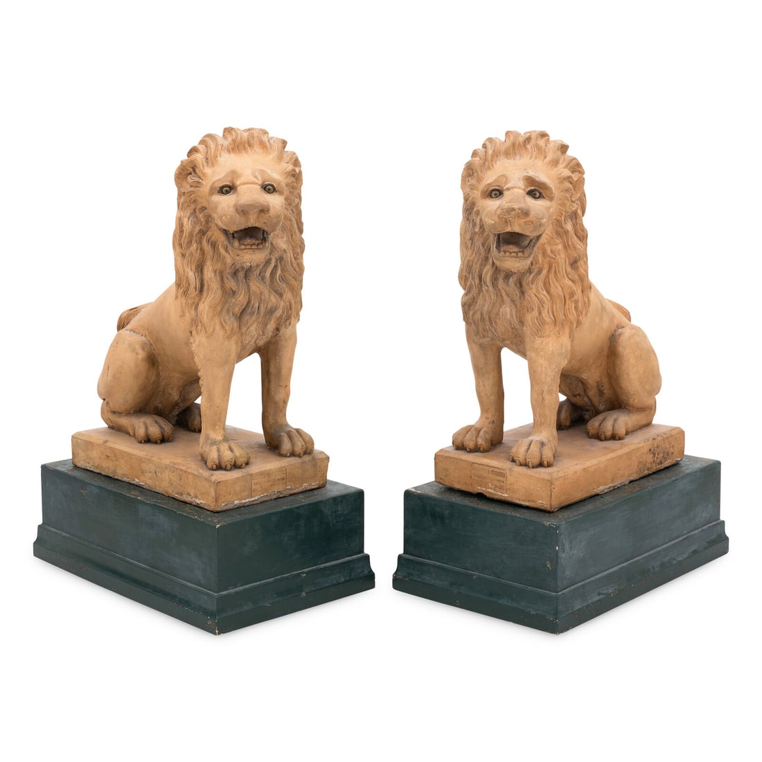 A Pair of Large French Terracotta Lions: A Pair of Large French Terracotta Lions Mandeville and Bernier, Early 20th Century each stamped with the maker's label, raised on associated green painted wood bases. Height (without bases) 29 x