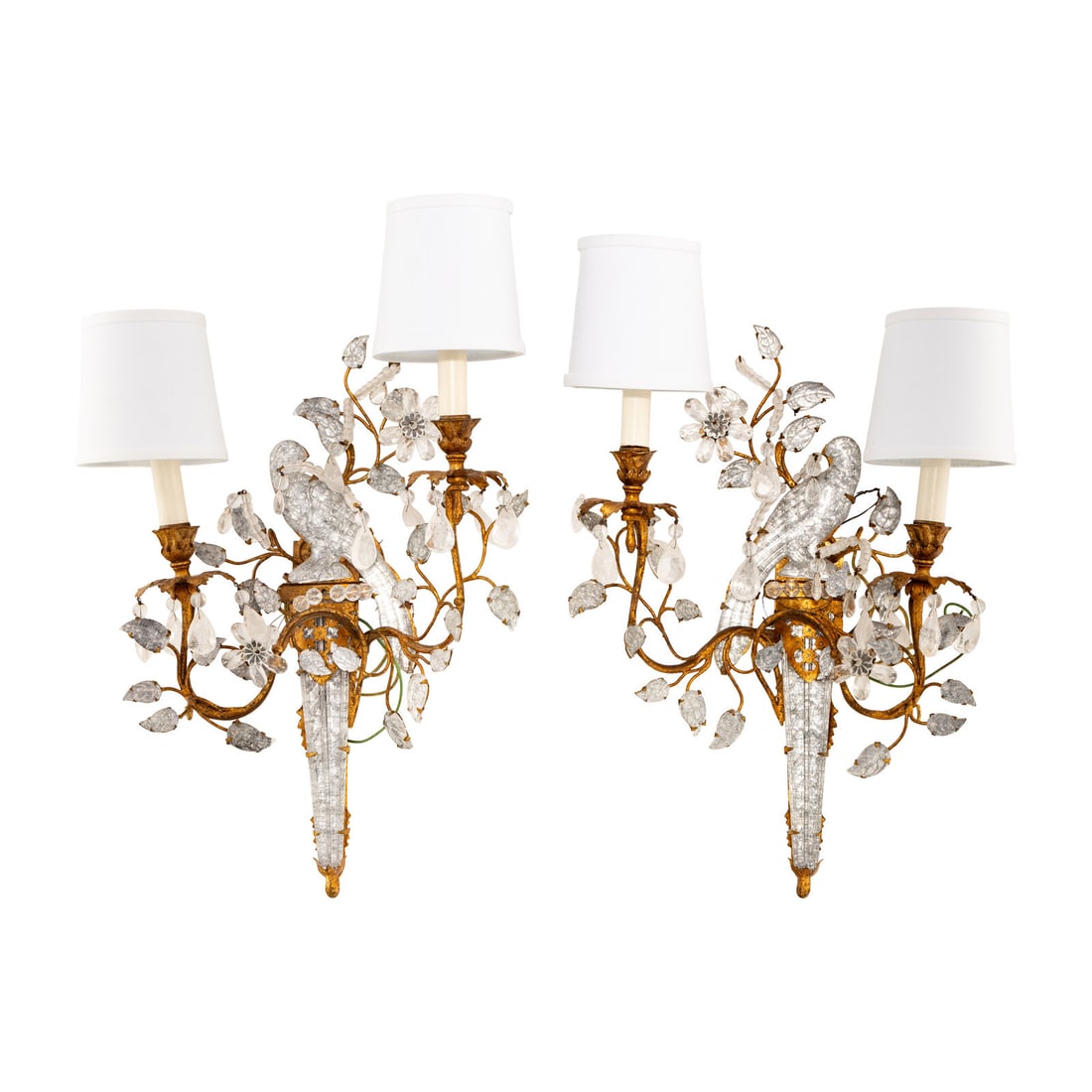 A Pair of Gilt Metal and Rock Crystal Two-Light Sconces: A Pair of Gilt Metal and Rock Crystal Two-Light Sconces Manner of Maison BaguËs, Mid-Late 20th Century Height 21 1/4 x width 14 1/2 x depth 6 inches. This lot is located in Chicago.