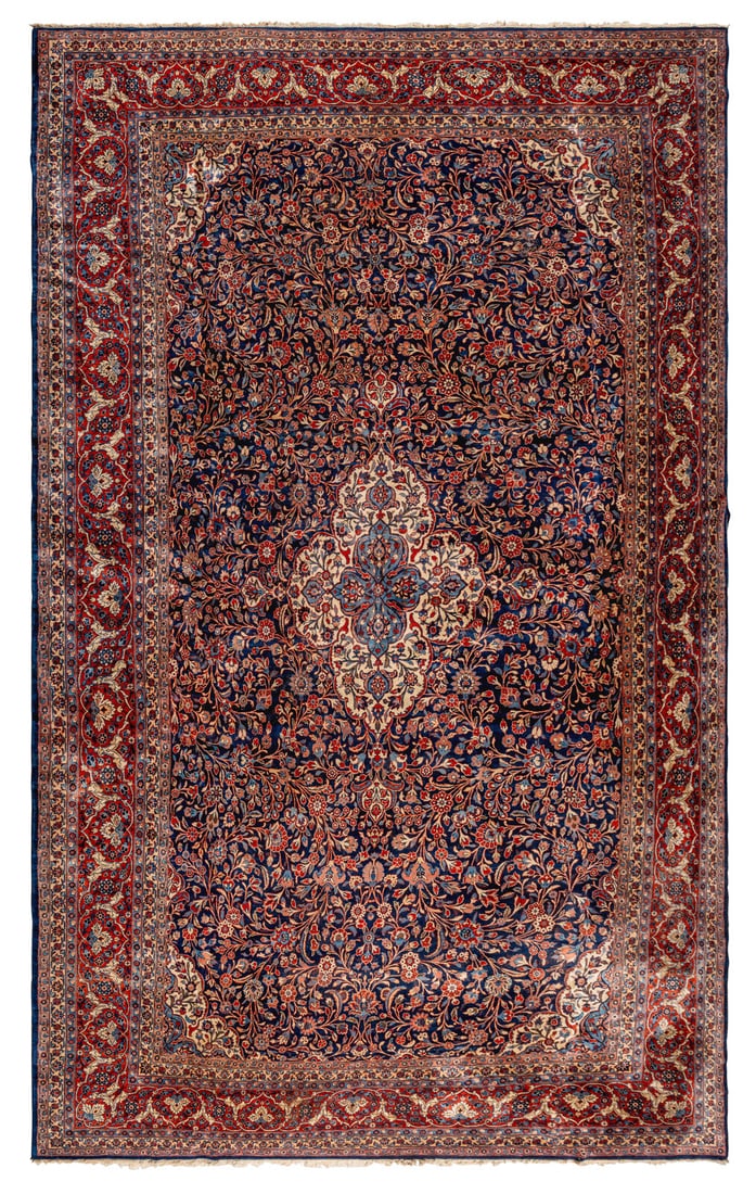 A Kirman Carpet: A Kirman Carpet South Central Persia, Early 20th Century 18 feet 7 inches x 11 feet 6 inches. Property of a California Collector This lot is located in Chicago. Provenance Bonhams, Los Angeles, Fine